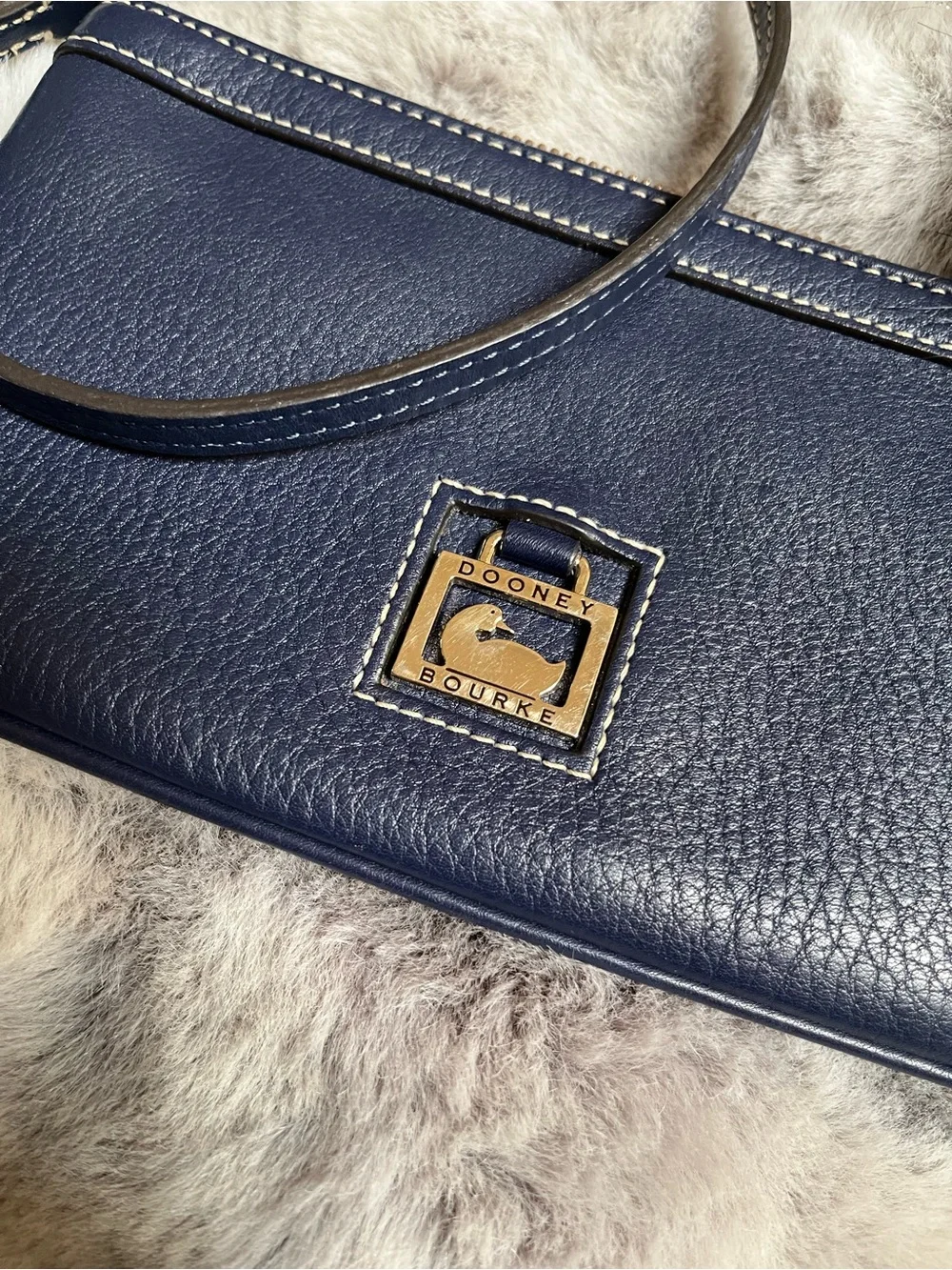 Dooney & Bourke Navy Pebbled Leather Wristlet with Fur Pom